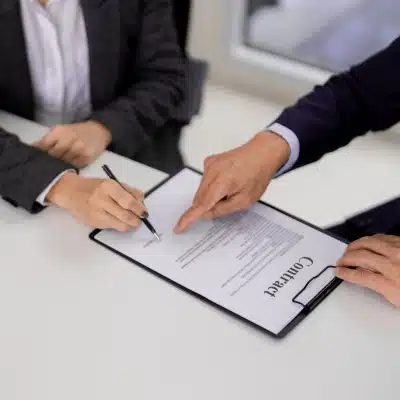 Contract sign scenarios representing commercial dealing, we provide commercial lawsuit loans if your business have an active court case where you are the victim